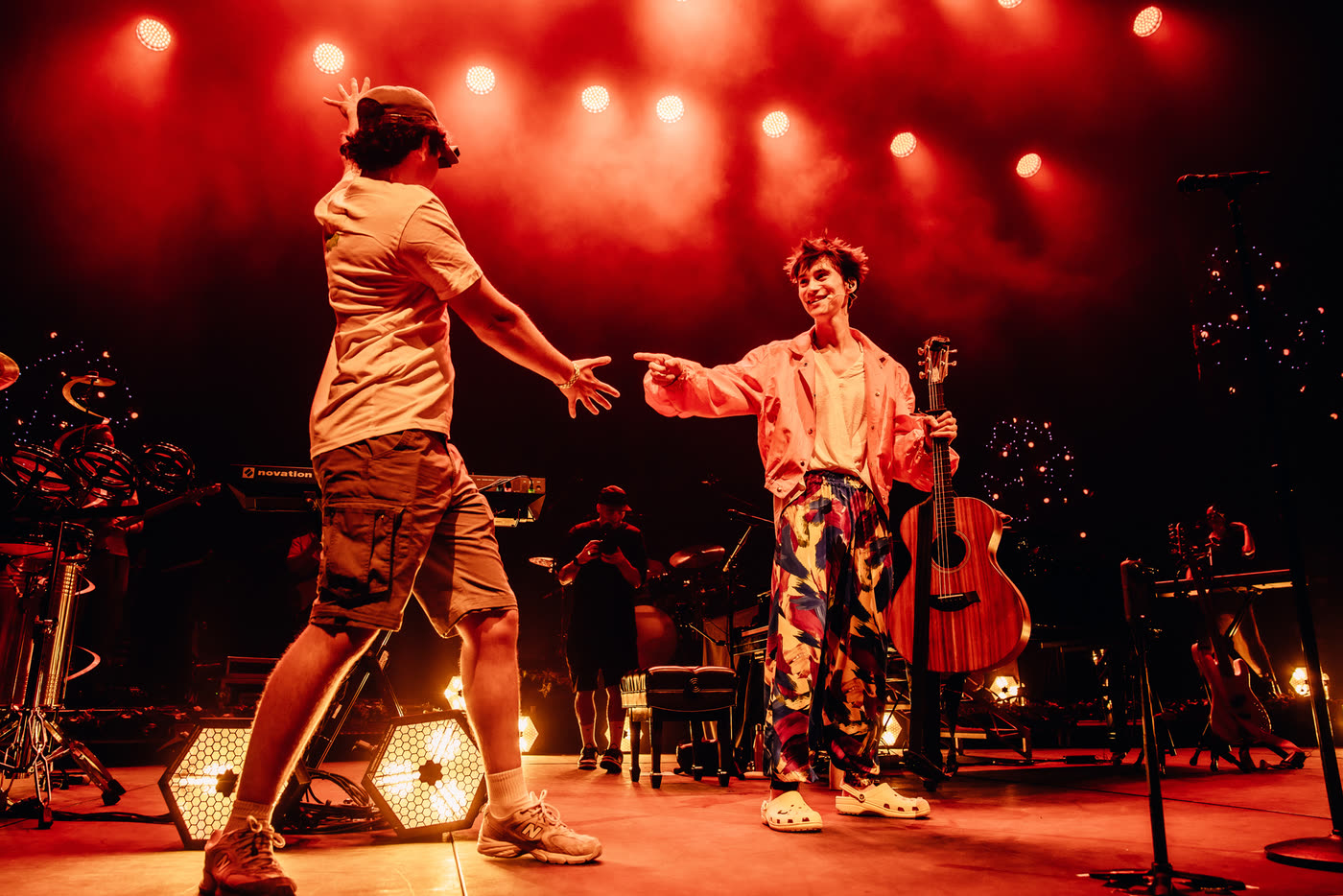Mert Boyali reaching out to Jacob Collier on stage at the ICC Sydney
